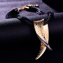 Load image into Gallery viewer, Black Gold Melanin Tribal Future Horn Necklace
